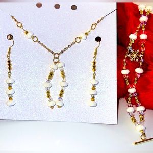 Beautiful snowy snowflake themed earring, necklace, and bracelet set. $40